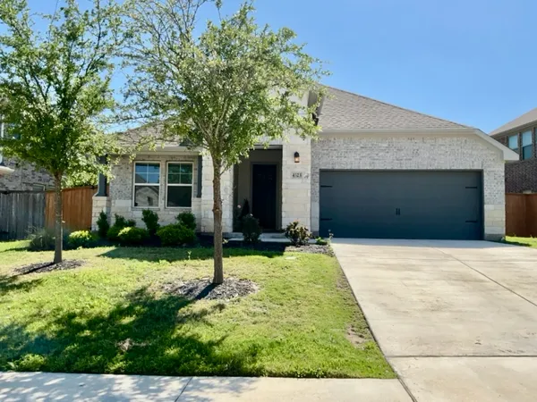 a front view of house with yard
