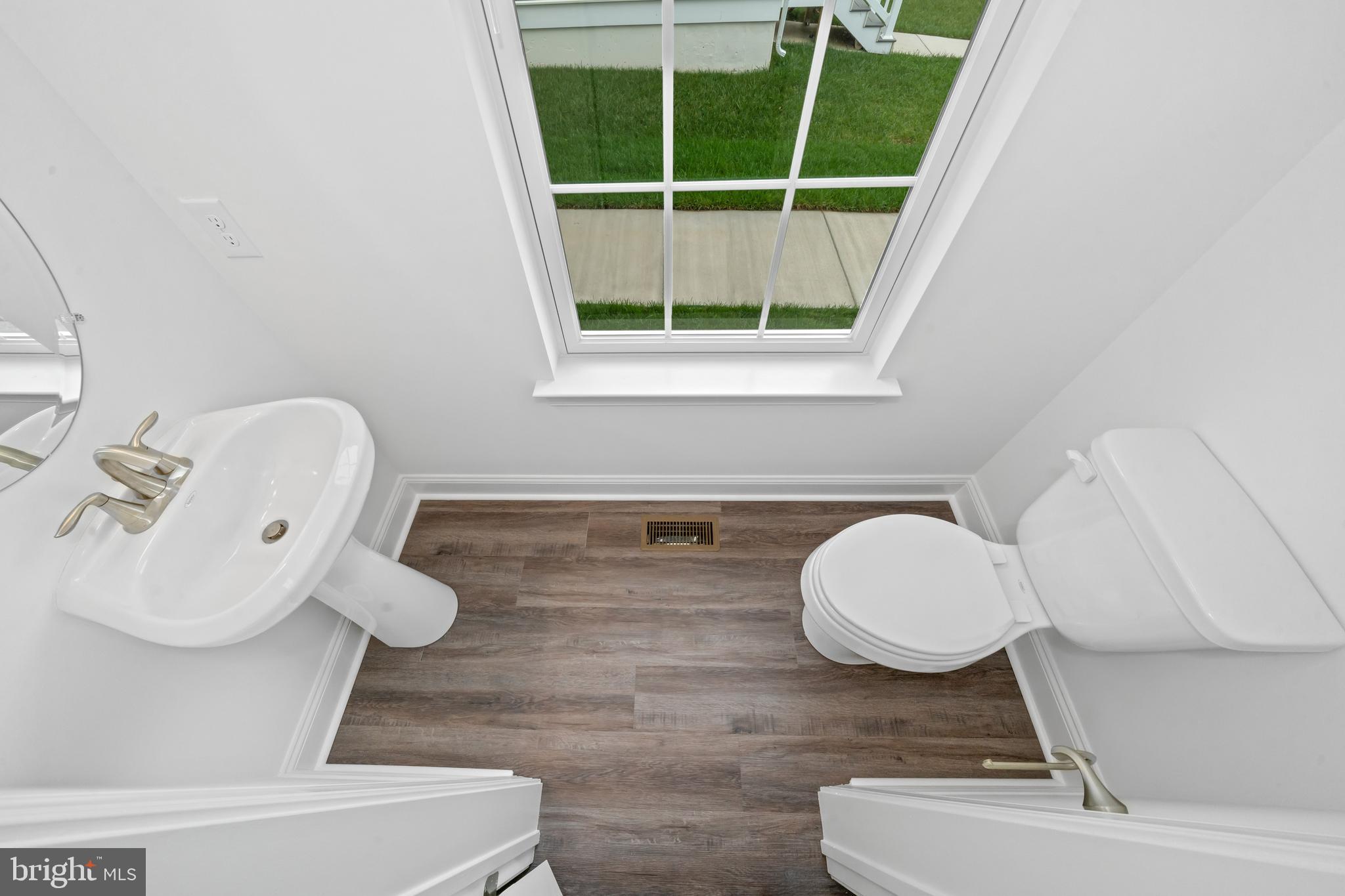 845 Mapleton Avenue Middletown, DE 19709 - Photo 15 of 30 a bathroom with a sink and toilet