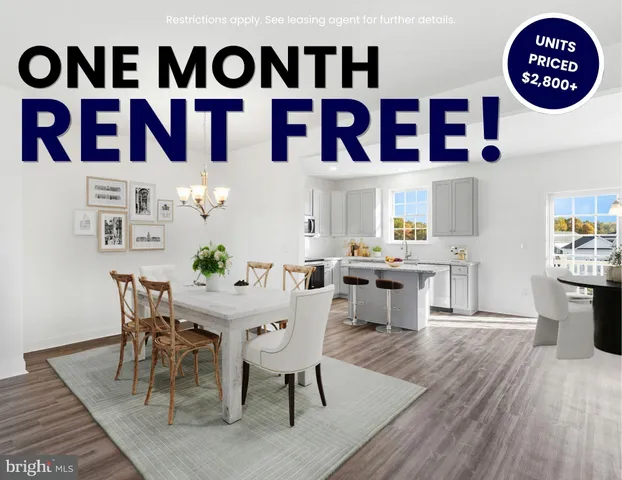a view of a dining area with furniture and kitchen in it