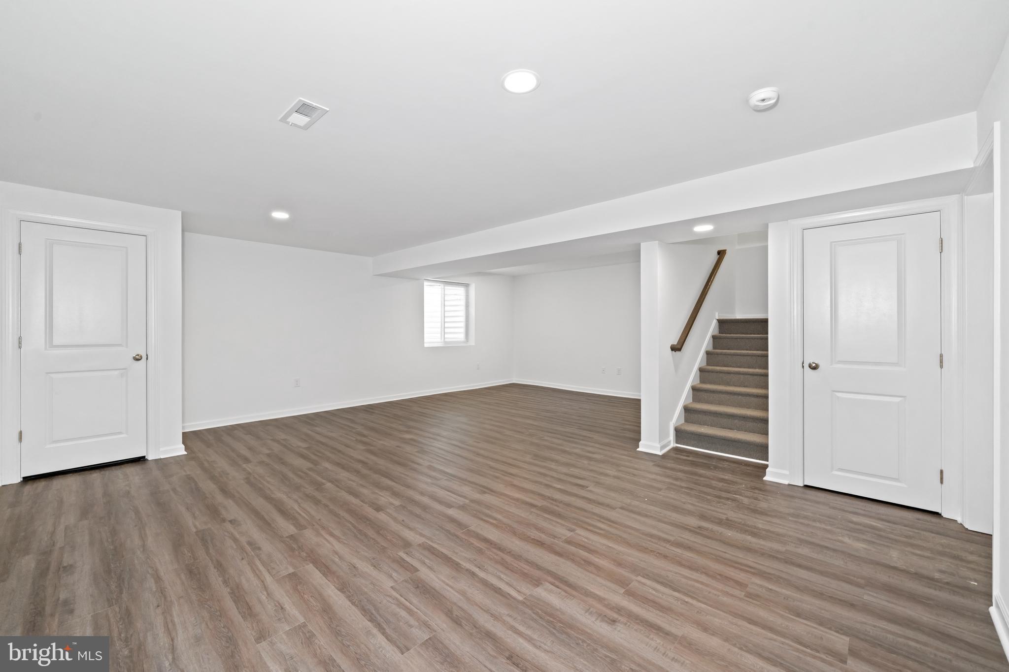 845 Mapleton Avenue Middletown, DE 19709 - Photo 29 of 30 wooden floor in an empty room with a window