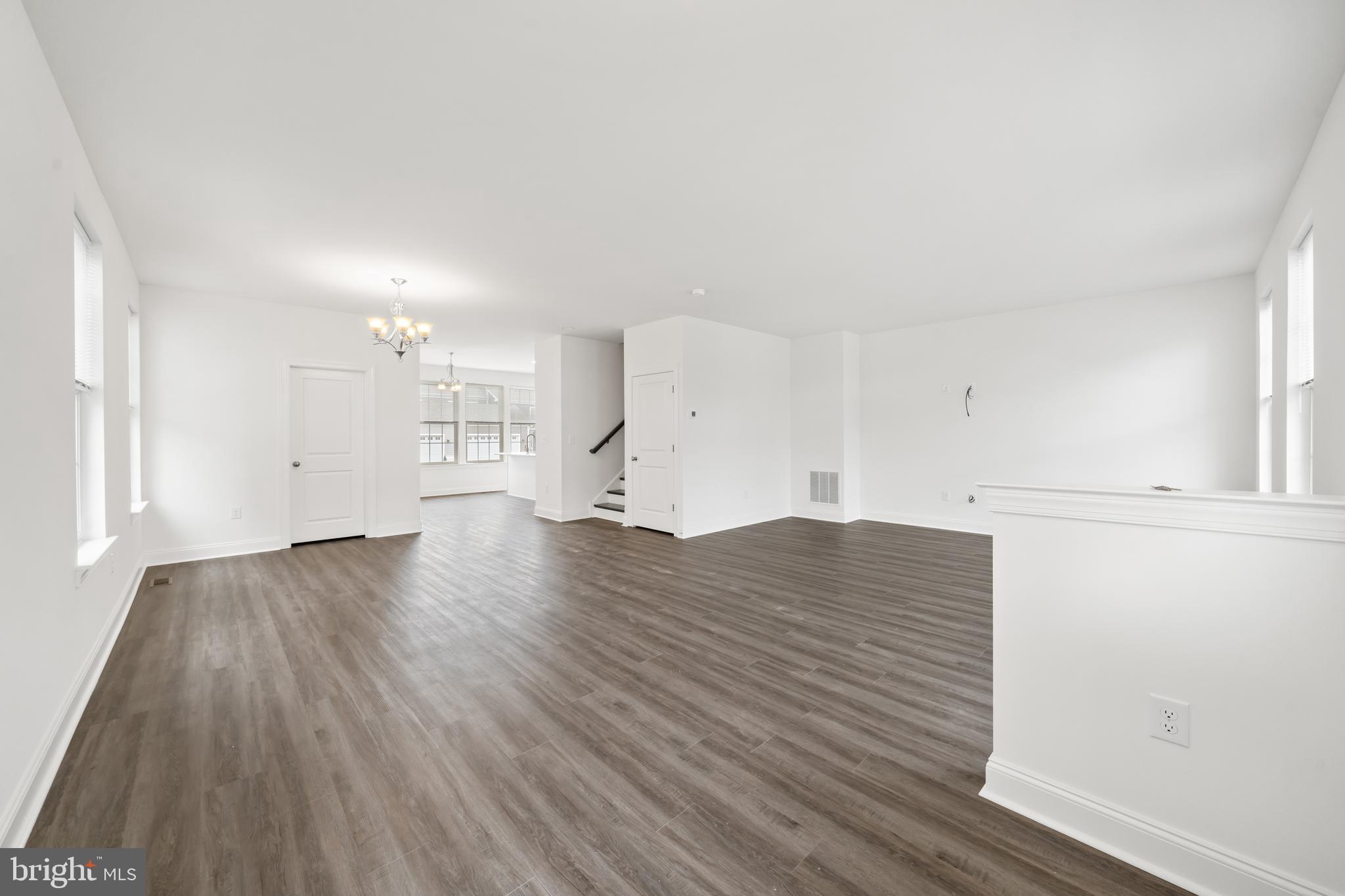 845 Mapleton Avenue Middletown, DE 19709 - Photo 8 of 30 a view of empty room with wooden floor