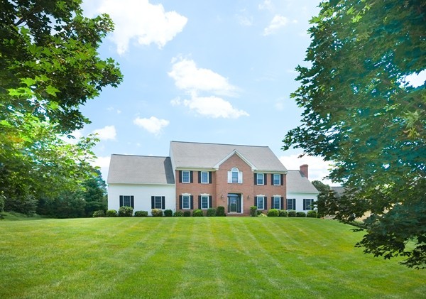 45 York Road Wayland, MA 01778 - Photo 1 of 30 a front view of a house with a garden