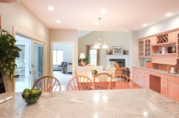 45 York Road Wayland, MA 01778 - Photo 11 of 30 a living room with fireplace furniture and a potted plant