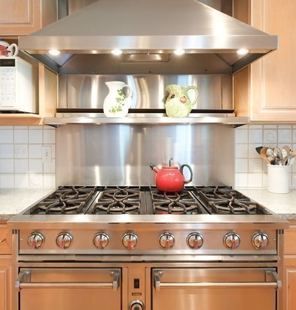 45 York Road Wayland, MA 01778 - Photo 12 of 30 a kitchen with a stove and wooden cabinets