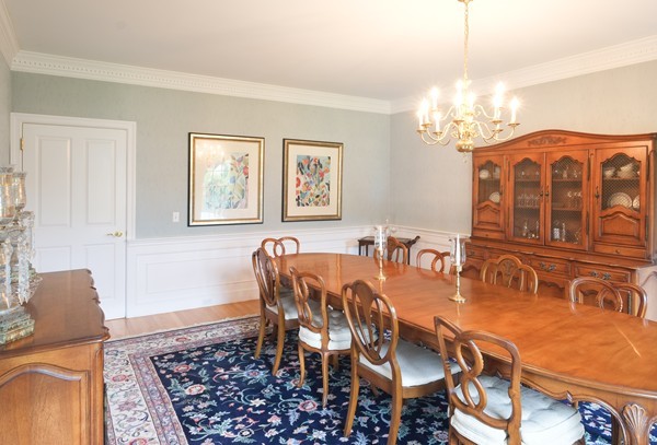 45 York Road Wayland, MA 01778 - Photo 4 of 30 a view of a dining room with furniture a chandelier and wooden floor