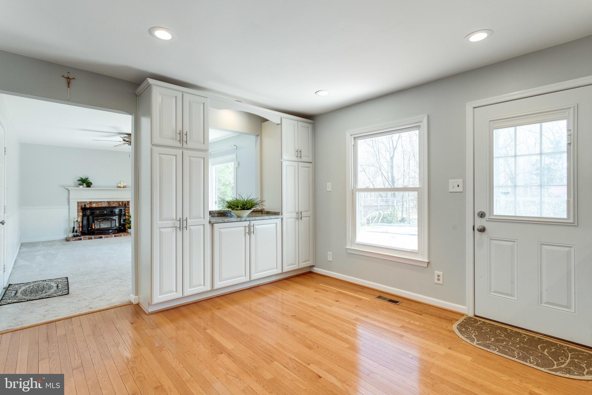 9107 Rookings Court Springfield, VA 22153 - Photo 18 of 86 Elegant Built-in Cabinetry w/Opening to Family Rm