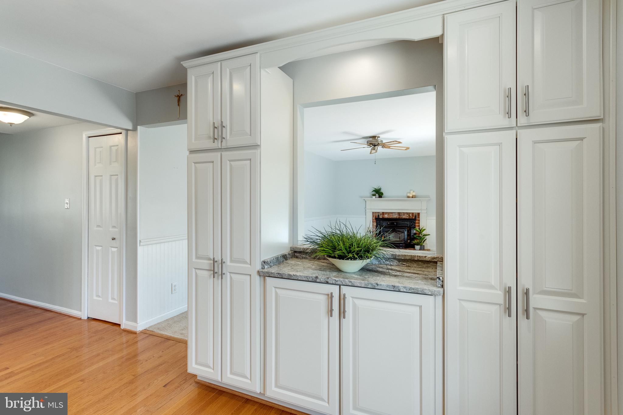 9107 Rookings Court Springfield, VA 22153 - Photo 19 of 86 Elegant Built-in Cabinetry w/Opening to Family Rm
