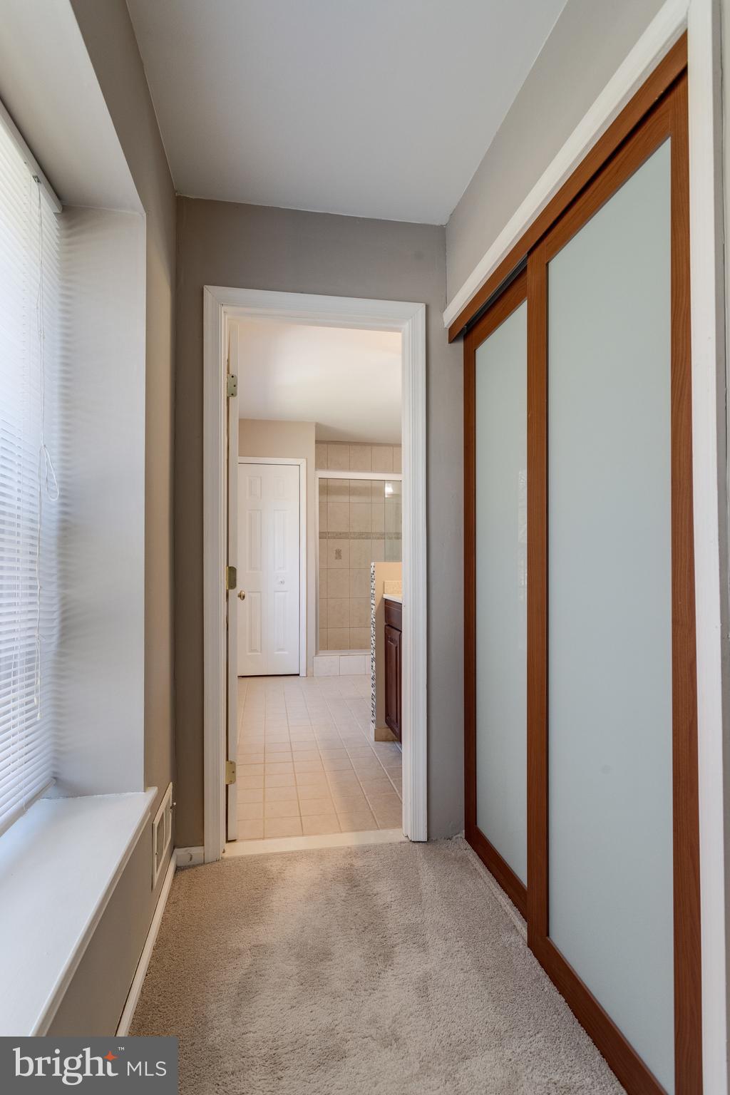 9107 Rookings Court Springfield, VA 22153 - Photo 38 of 86 Shoji-Style Doors to 1 of 2 Lrg Closets in MSTBR