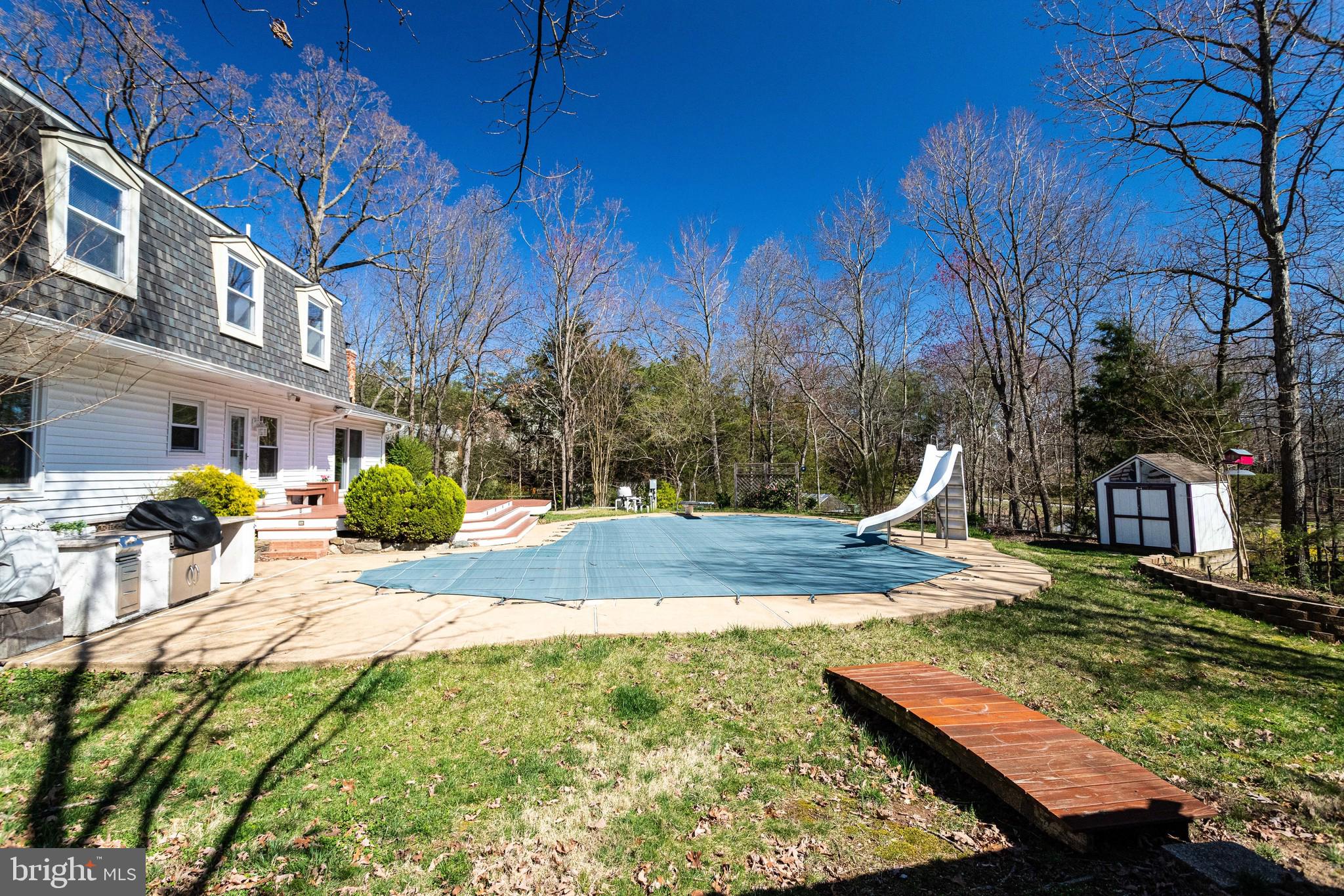 9107 Rookings Court Springfield, VA 22153 - Photo 60 of 86 In-grd Pool w/Slide & Diving Board - 3' - 10' Deep