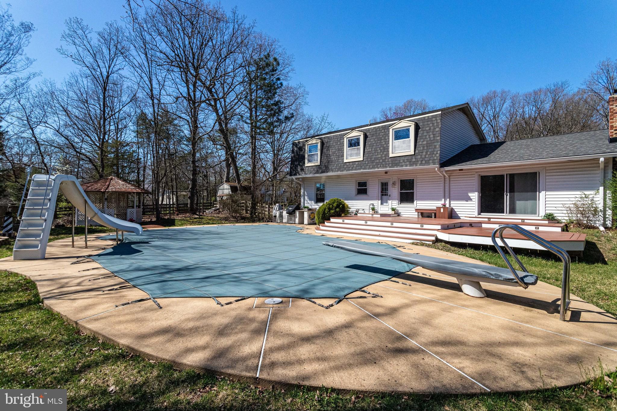 9107 Rookings Court Springfield, VA 22153 - Photo 65 of 86 In-grd Pool w/Slide & Diving Board - 3' - 10' Deep