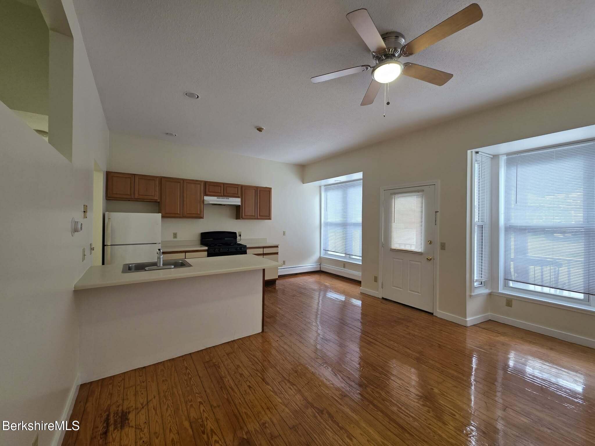 19 Pleasant Street, Unit 1A Adams, MA 01220 - Photo 5 of 13 Living to Kitchen View