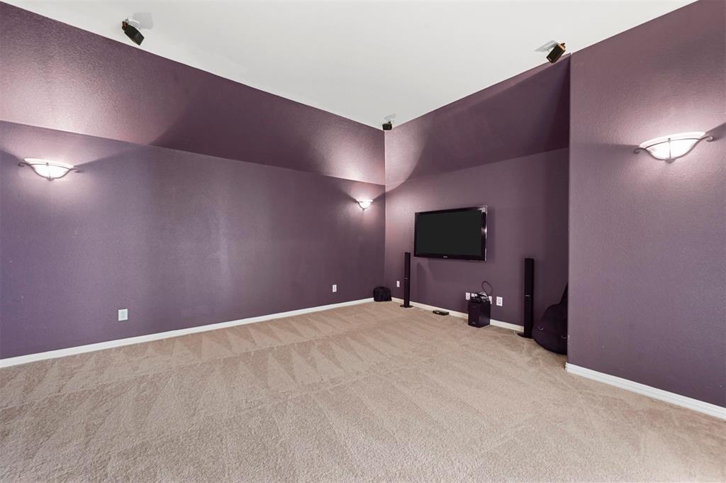 14815 Frisco Ranch Drive Little Elm, TX 75068 - Photo 25 of 40 a view of an empty room with a fireplace