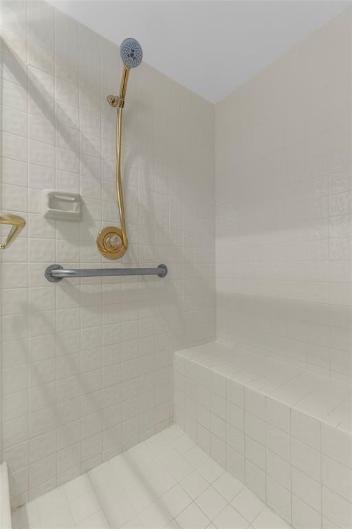 10971 Lake Front Place, Unit 10971 Boca Raton, FL 33498 - Photo 27 of 33 a bathroom with a bath tub