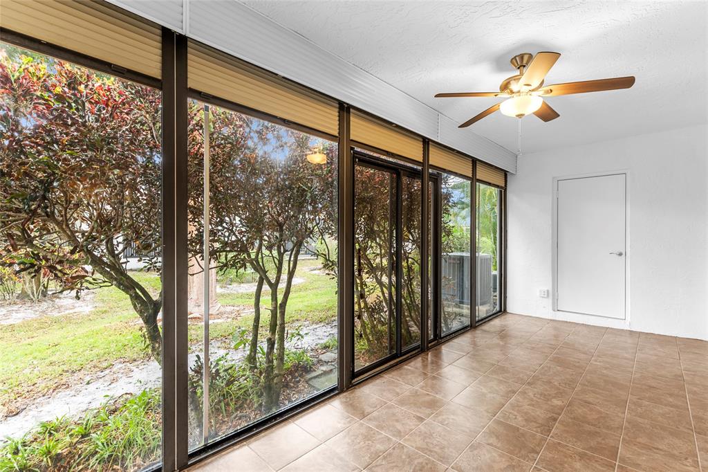 10971 Lake Front Place, Unit 10971 Boca Raton, FL 33498 - Photo 28 of 33 a view of a room with a large window