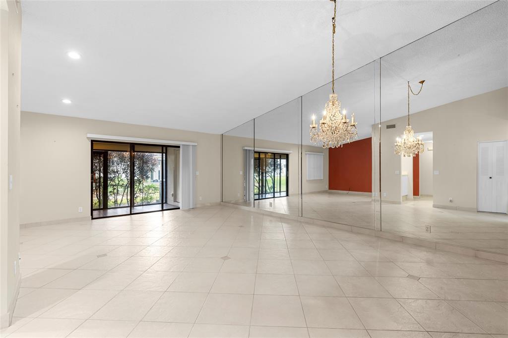 10971 Lake Front Place, Unit 10971 Boca Raton, FL 33498 - Photo 8 of 33 a view of an empty room with a window