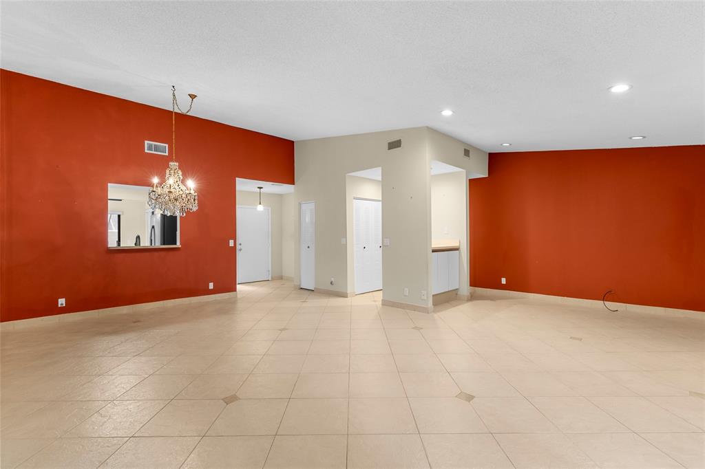 10971 Lake Front Place, Unit 10971 Boca Raton, FL 33498 - Photo 9 of 33 a view of an empty room with a window