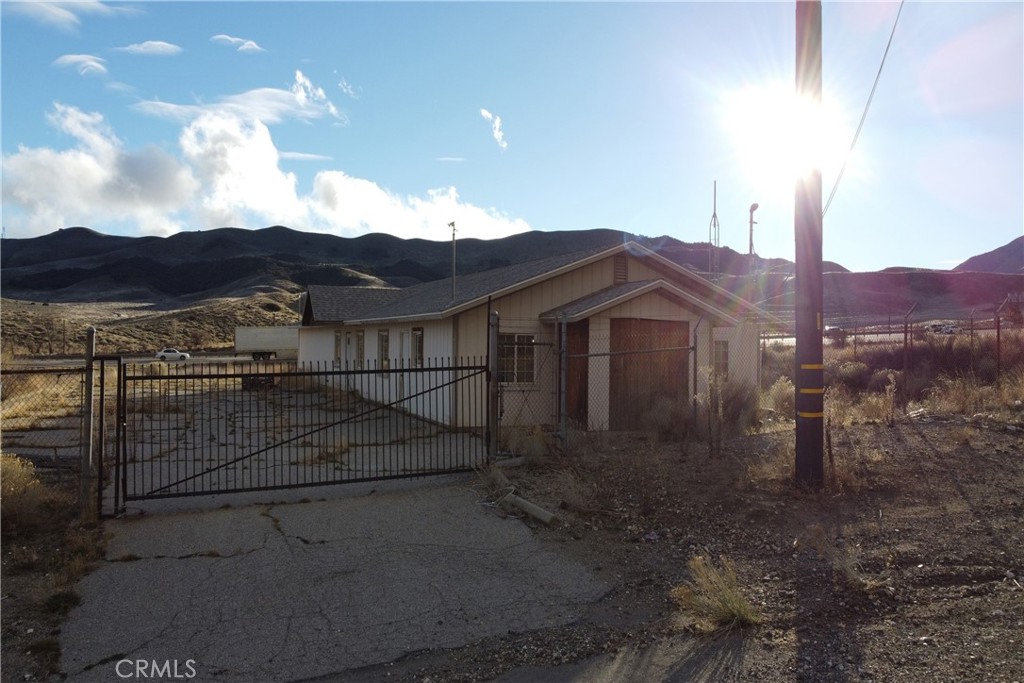 49851 Gorman Post Road Lebec, CA 93243 - Photo 20 of 42 a view of a house with a yard