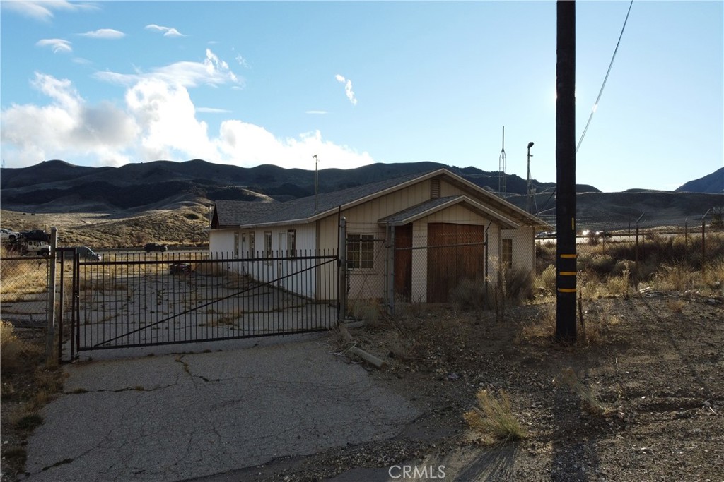 49851 Gorman Post Road Lebec, CA 93243 - Photo 21 of 42 a view of a house with a yard