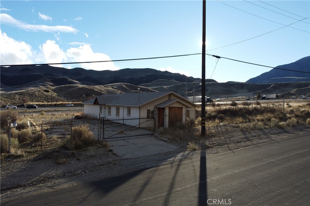 49851 Gorman Post Road Lebec, CA 93243 - Photo 24 of 42 a view of a house with a street