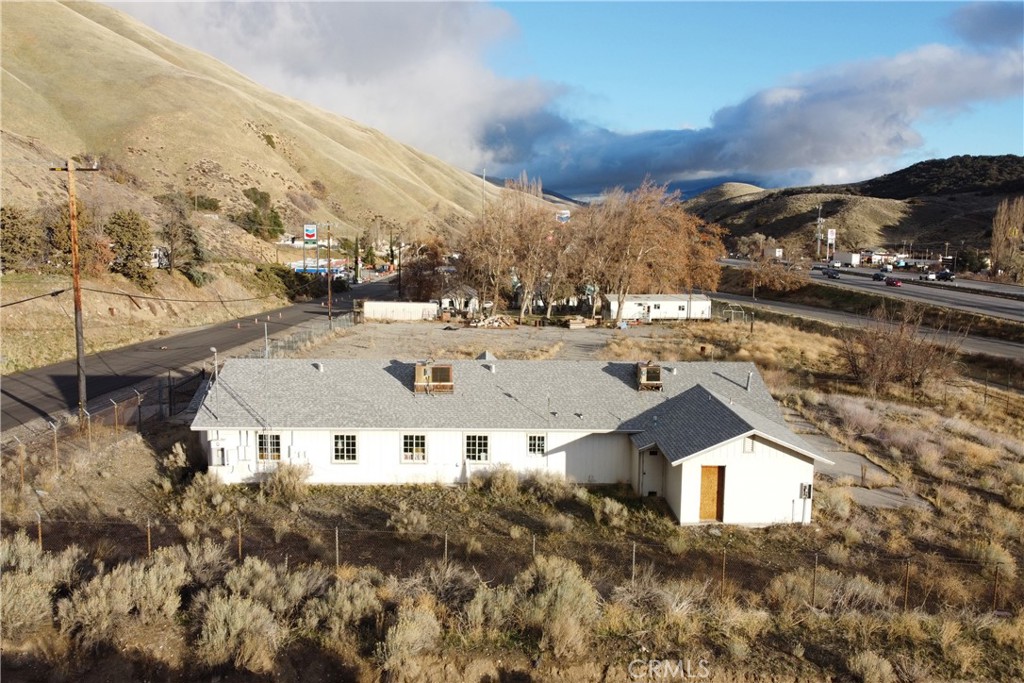49851 Gorman Post Road Lebec, CA 93243 - Photo 30 of 42 a view of a house with a mountain in the background