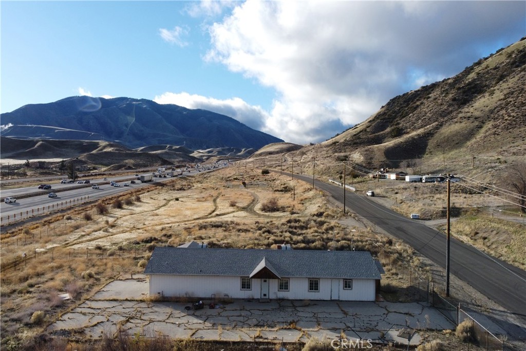 49851 Gorman Post Road Lebec, CA 93243 - Photo 5 of 42 a view of house with a mountain in the background