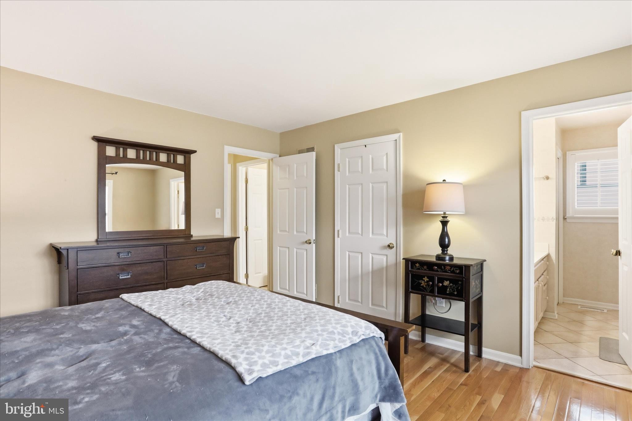 96 Phoenix Lane Falling Waters, WV 25419 - Photo 28 of 37 a bedroom with a bed and a table in it