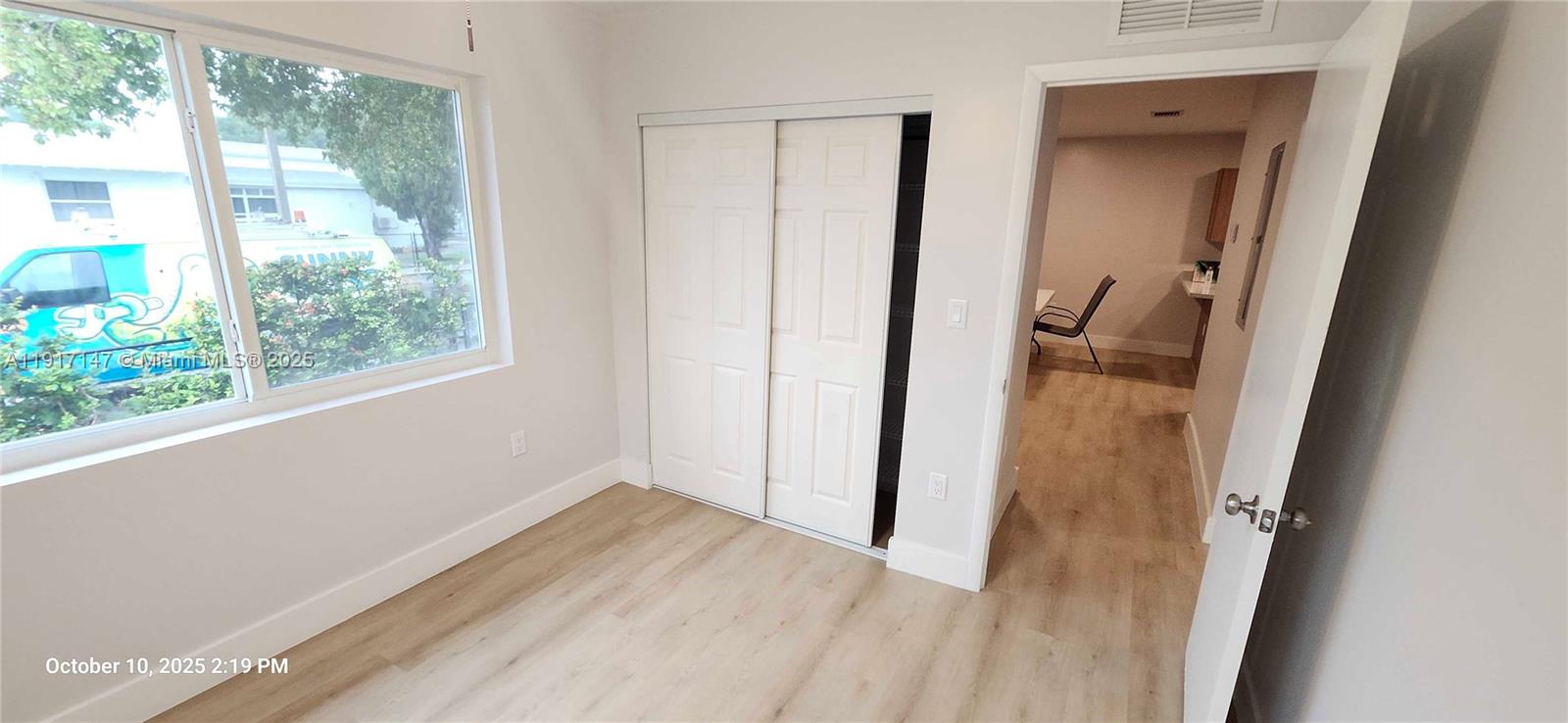 4557 Northwest 14th Avenue, Unit 4557 Miami, FL 33142 - Photo 11 of 13 an entryway of a house and wooden floor