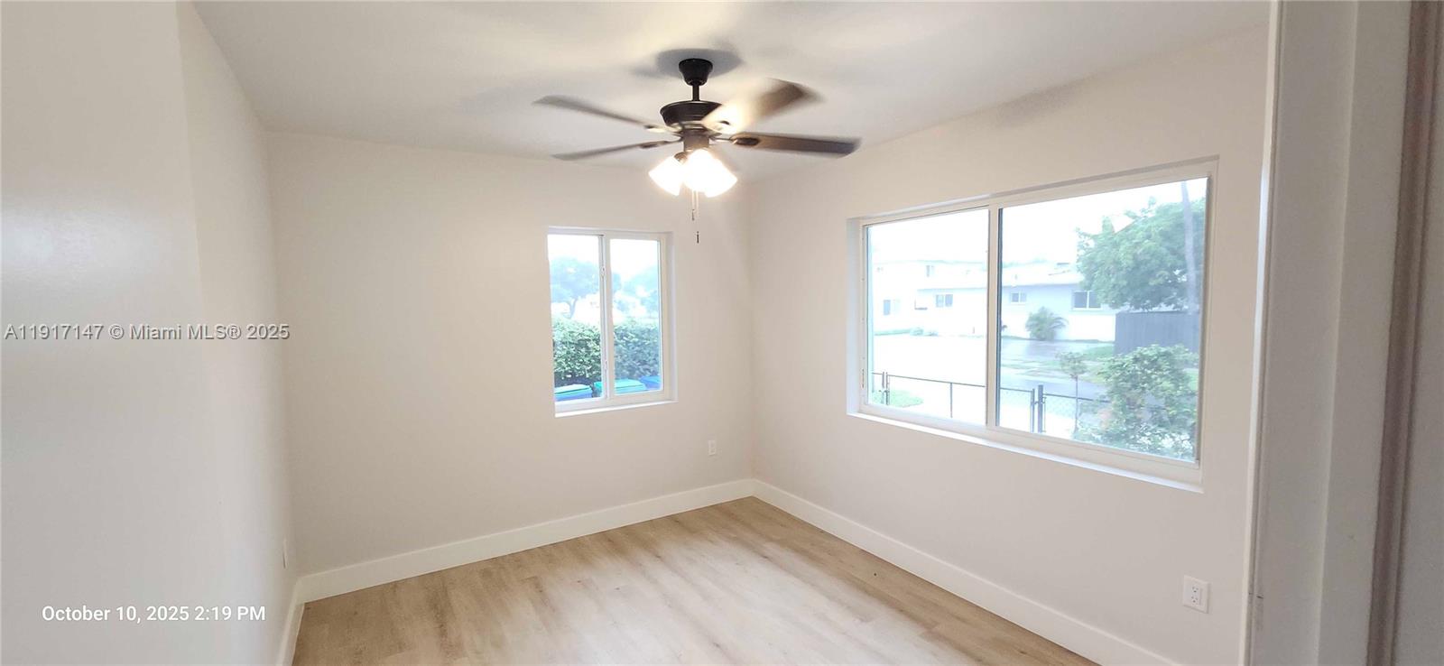 4557 Northwest 14th Avenue, Unit 4557 Miami, FL 33142 - Photo 10 of 13 a view of an empty room with a window