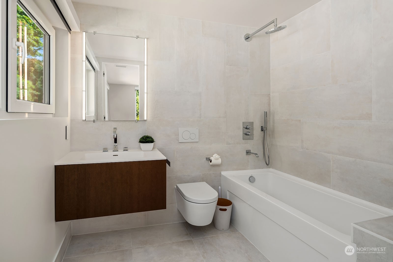 3225 Evergreen Point Road Medina, WA 98039 - Photo 14 of 34 a bathroom with a bathtub sink mirror and toilet