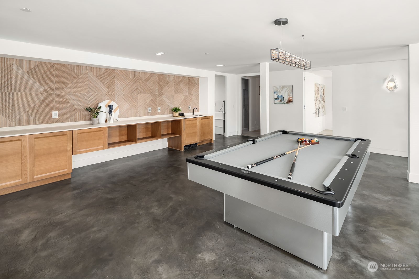 3225 Evergreen Point Road Medina, WA 98039 - Photo 25 of 34 a living room with stainless steel appliances kitchen island granite countertop furniture and a view of living room