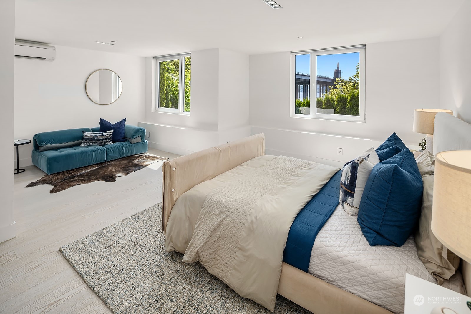 3225 Evergreen Point Road Medina, WA 98039 - Photo 26 of 34 a bed room with a bed window and wall painting