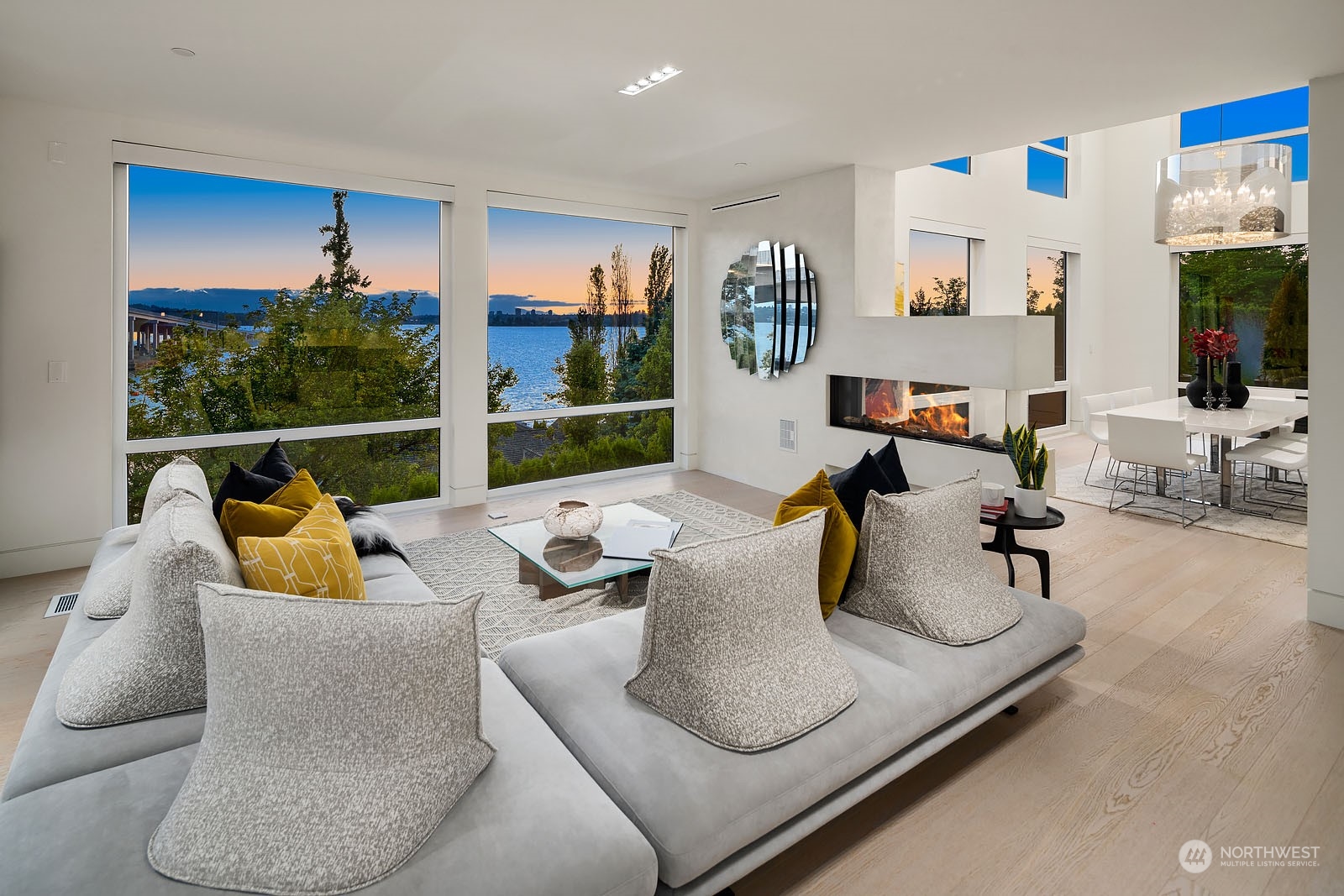 3225 Evergreen Point Road Medina, WA 98039 - Photo 5 of 34 a living room with furniture and a floor to ceiling window