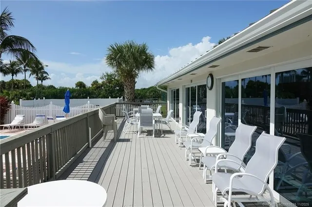 a view of balcony with furniture