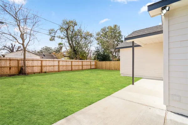 a view of a backyard with a garden