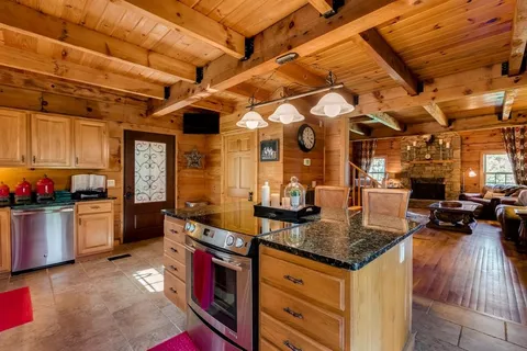 a kitchen with granite countertop lots of counter top space