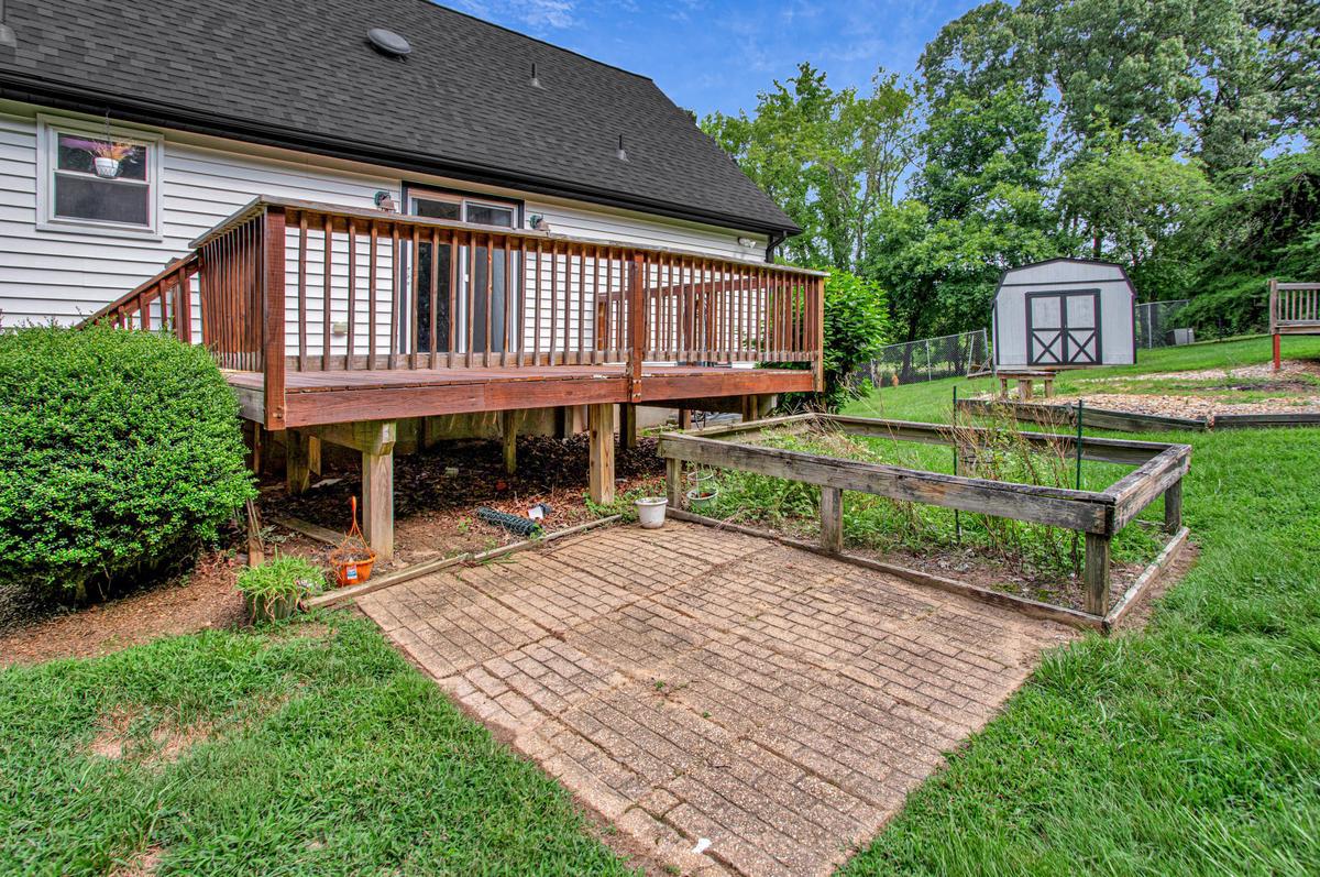 8070 Nursery Road Lusby, MD 20657 - Photo 44 of 47 Rear yard with patio and protected garden.