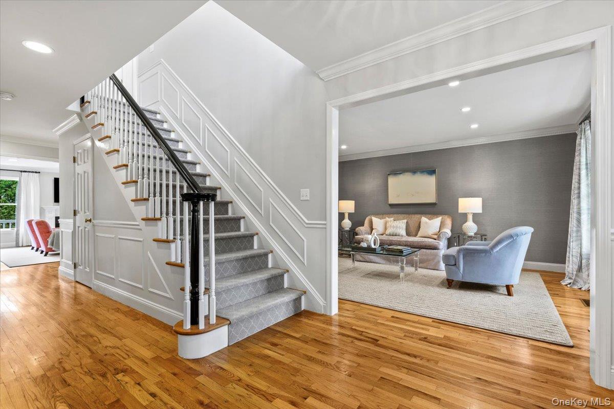 76 Davis Avenue Rye, NY 10580 - Photo 4 of 39 Elegant center hall sets the tone adorned with custom millwork continuing throughout to second floor.