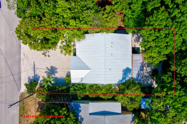 a kitchen with stainless steel appliances granite countertop a stove a sink dishwasher and a microwave oven with cabinets