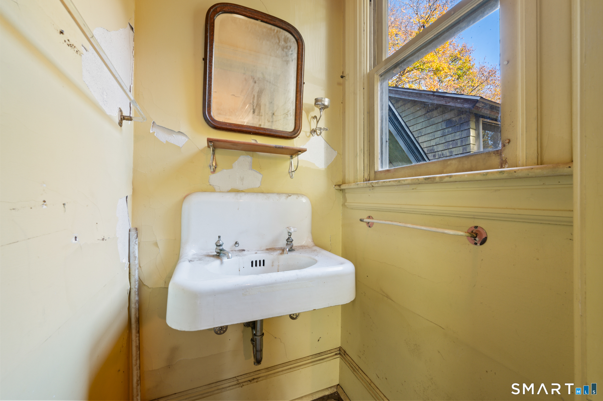 124 River Road Willington, CT 06279 - Photo 40 of 40 a bathroom with a sink and a mirror