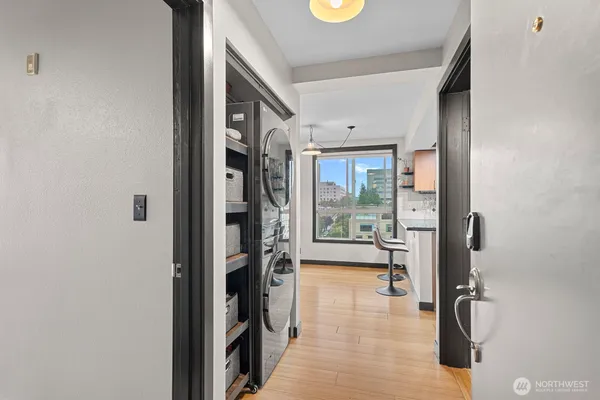 a view of a hallway with a living room
