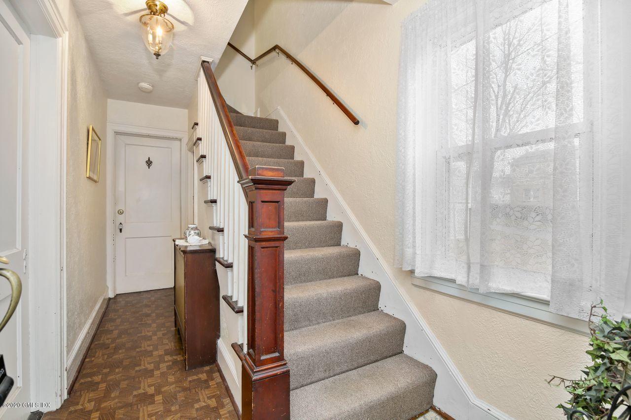 28 St Roch Avenue Greenwich, CT 06830 - Photo 2 of 15 a view of entryway and hall with wooden floor