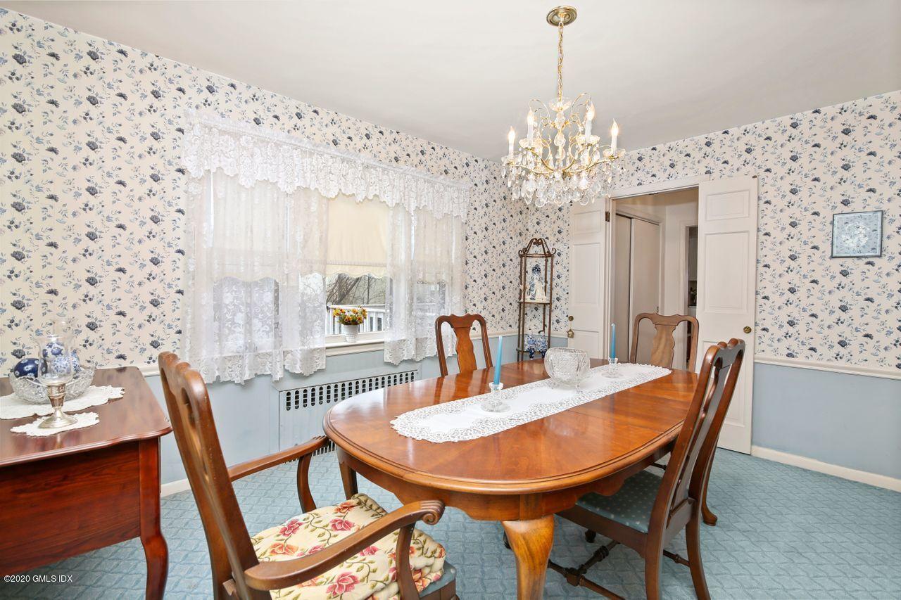 28 St Roch Avenue Greenwich, CT 06830 - Photo 3 of 15 a dining room with furniture and window