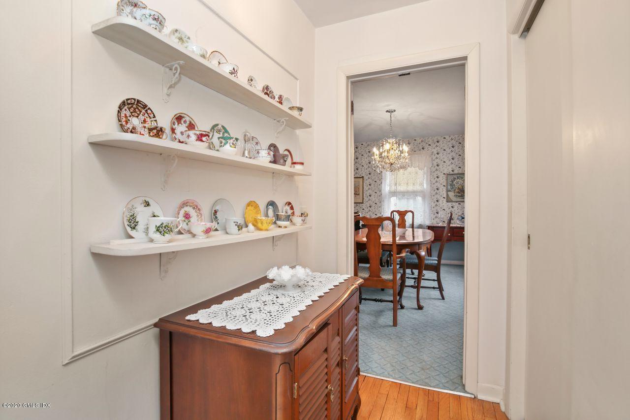 28 St Roch Avenue Greenwich, CT 06830 - Photo 5 of 15 a view of dining table and chairs