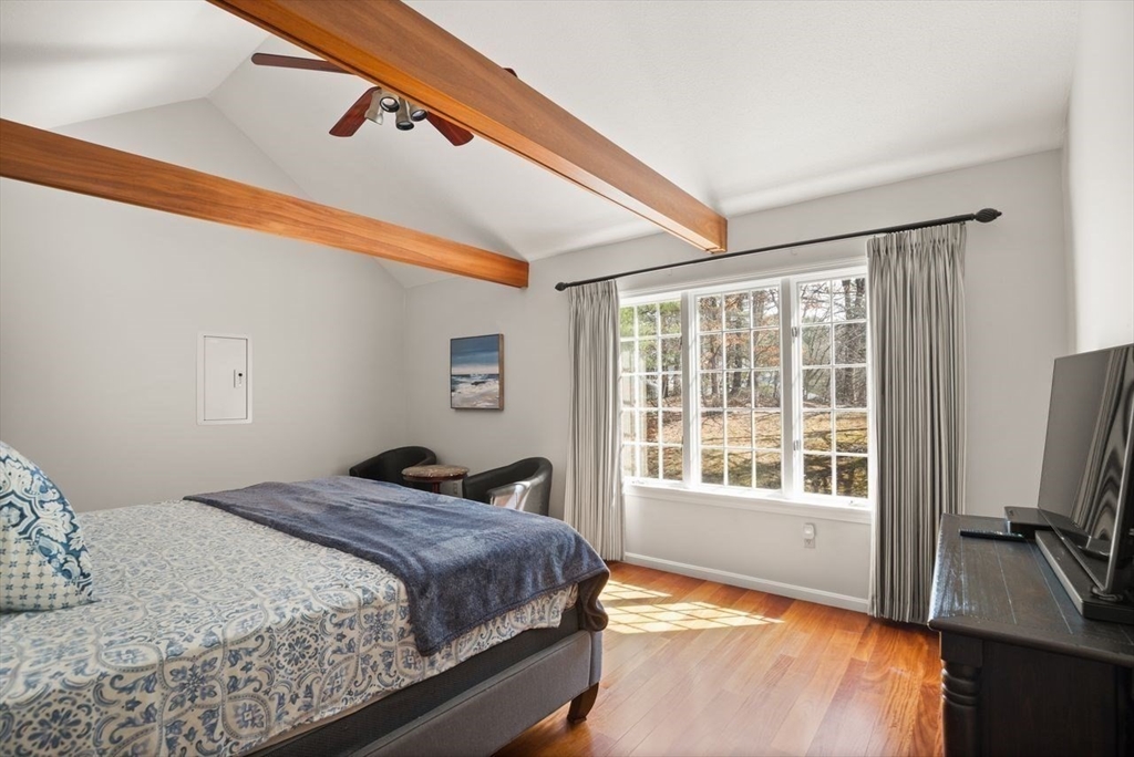 8 Bellingham Court, Unit 92 Middleton, MA 01949 - Photo 19 of 35 a bedroom with a bed and a window