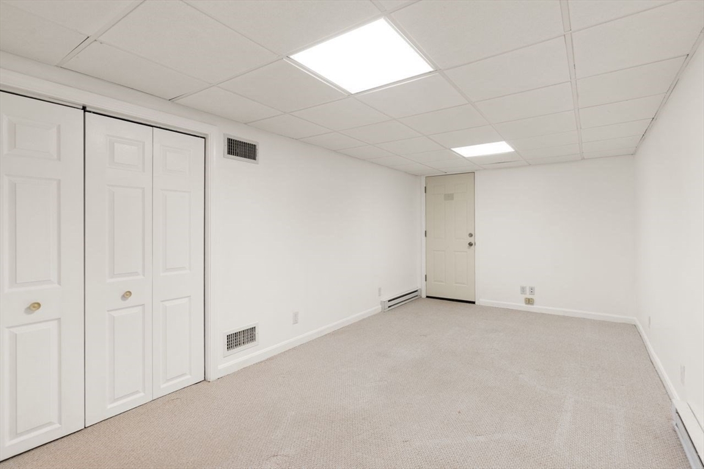 8 Bellingham Court, Unit 92 Middleton, MA 01949 - Photo 24 of 35 a view of an empty room