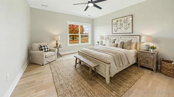 a spacious bedroom with a bed and a couch