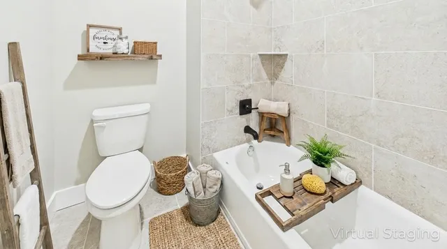 a living room with patio furniture and a floor to ceiling window