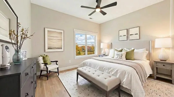 a view of a lake with a house in the background