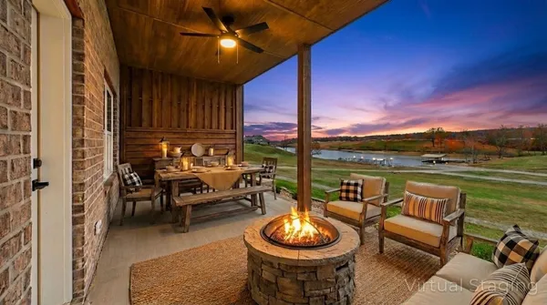 a view of a patio with a table chairs and a table