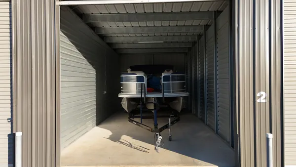 a view of a patio with swimming pool table and chairs